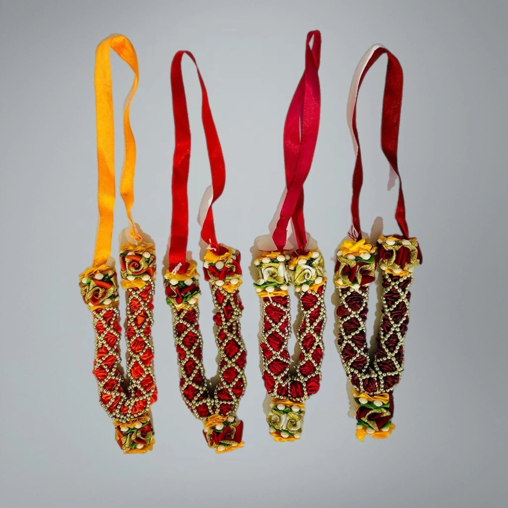 Deity garland texture and flower detail close-up - Bhakti Shop