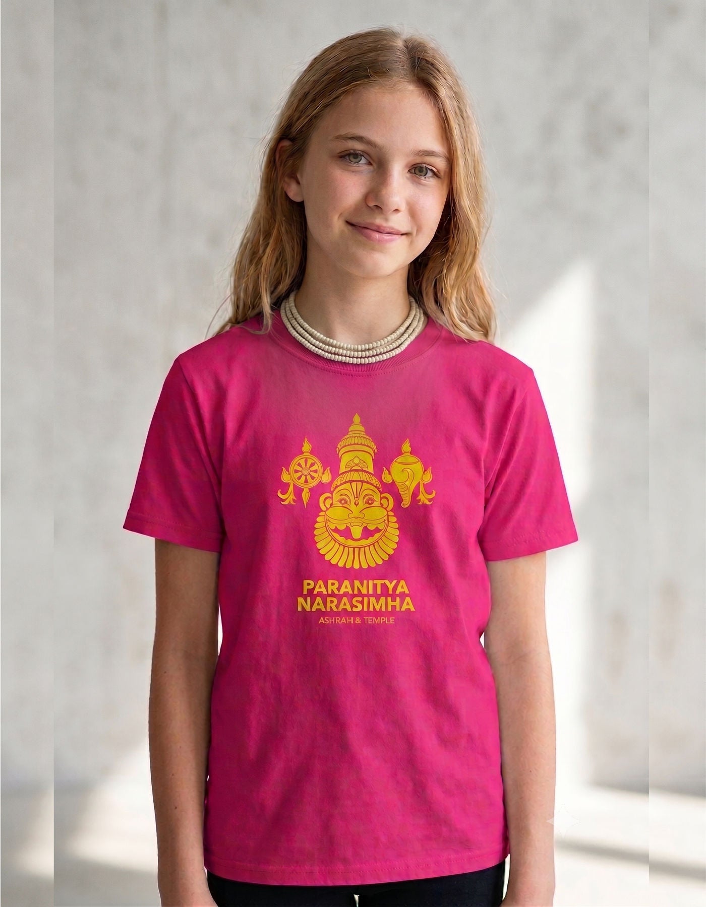 Close-up of gold-printed Narasimha face, shank, and chakra design on youth tee fabric - Bhakti Shop
